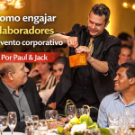 Palestrante interagindo com participantes em evento corporativo durante dinâmica com mágica, com o título “Como engajar colaboradores em evento corporativo – Por Paul & Jack”.