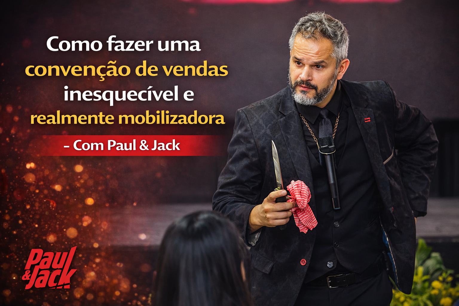 Paul & Jack em uma palestra, segurando uma faca com pano vermelho diante do público, com o título “Como fazer uma convenção de vendas inesquecível e realmente mobilizadora” e a logomarca Paul & Jack aplicada na arte.