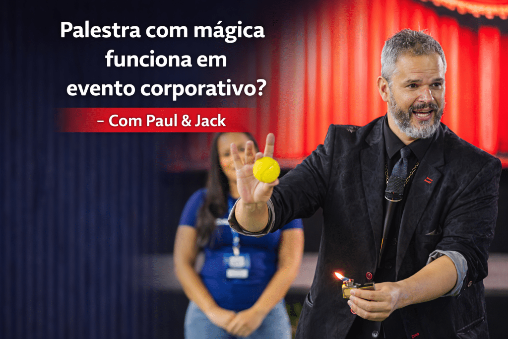 Palestrante Paul realiza um truque de mágica com bola amarela e isqueiro aceso durante apresentação em evento corporativo, em palestra de Paul & Jack.