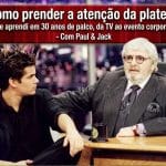 Paul & Jack em estúdio de televisão conversando sobre palco e comunicação, com título “Como prender a atenção da plateia: o que aprendi em 30 anos de palco, da TV ao evento corporativo”.
