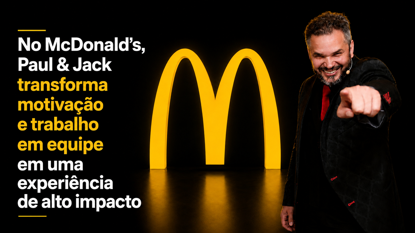 Capa 16:9 do artigo sobre a palestra de Paul & Jack para o McDonald’s, com o palestrante apontando para o público ao lado do símbolo amarelo do McDonald’s em fundo preto.