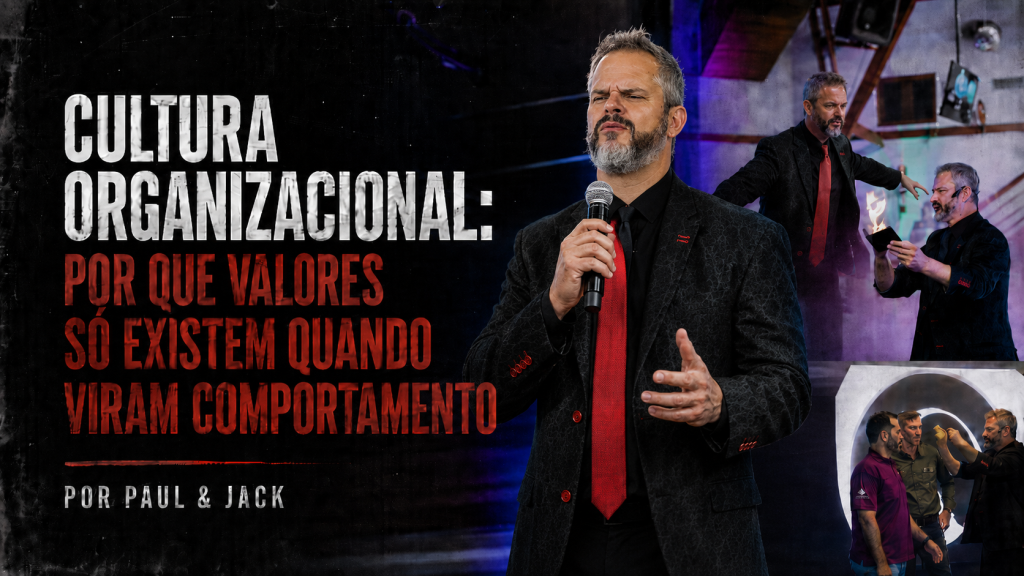 Capa de artigo em formato 16:9 com Paul & Jack em destaque no palco, em cena corporativa de forte presença, sobre fundo escuro e textura grunge. À esquerda, aparece o título “Cultura organizacional: por que valores só existem quando viram comportamento”, com a assinatura “Por Paul & Jack”.