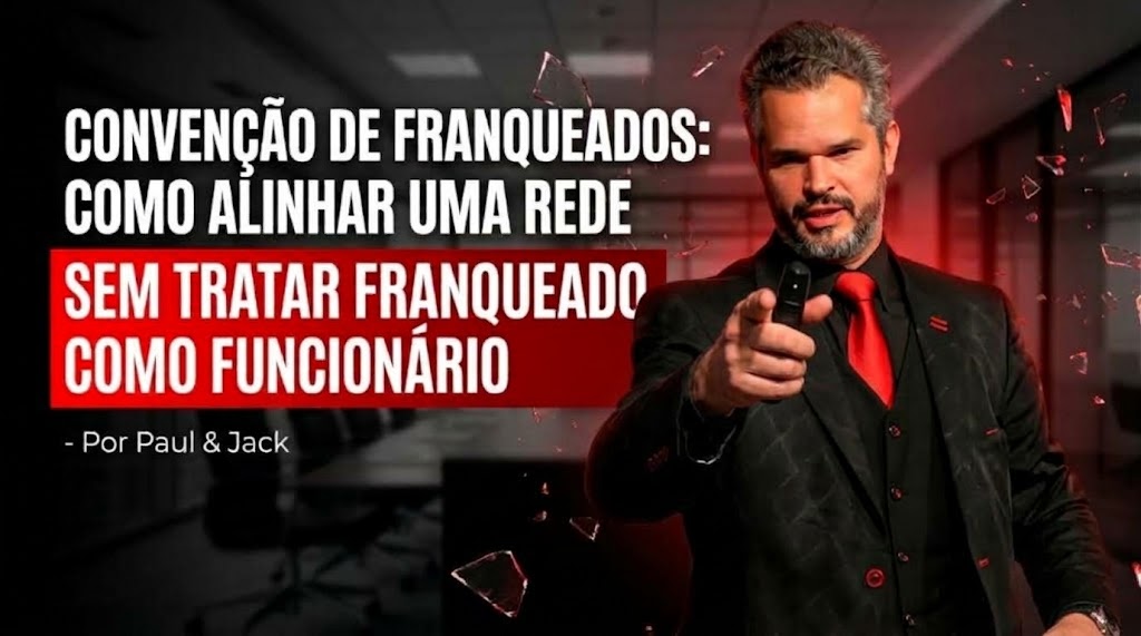 "Banner com o título 'Convenção de Franqueados: Como alinhar uma rede sem tratar franqueado como funcionário', por Paul & Jack. Imagem de um homem de terno e gravata vermelha apontando para o observador, com fragmentos de vidro voando."